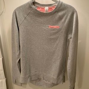 Size 12 ivivva sweatshirt with intertwined back.